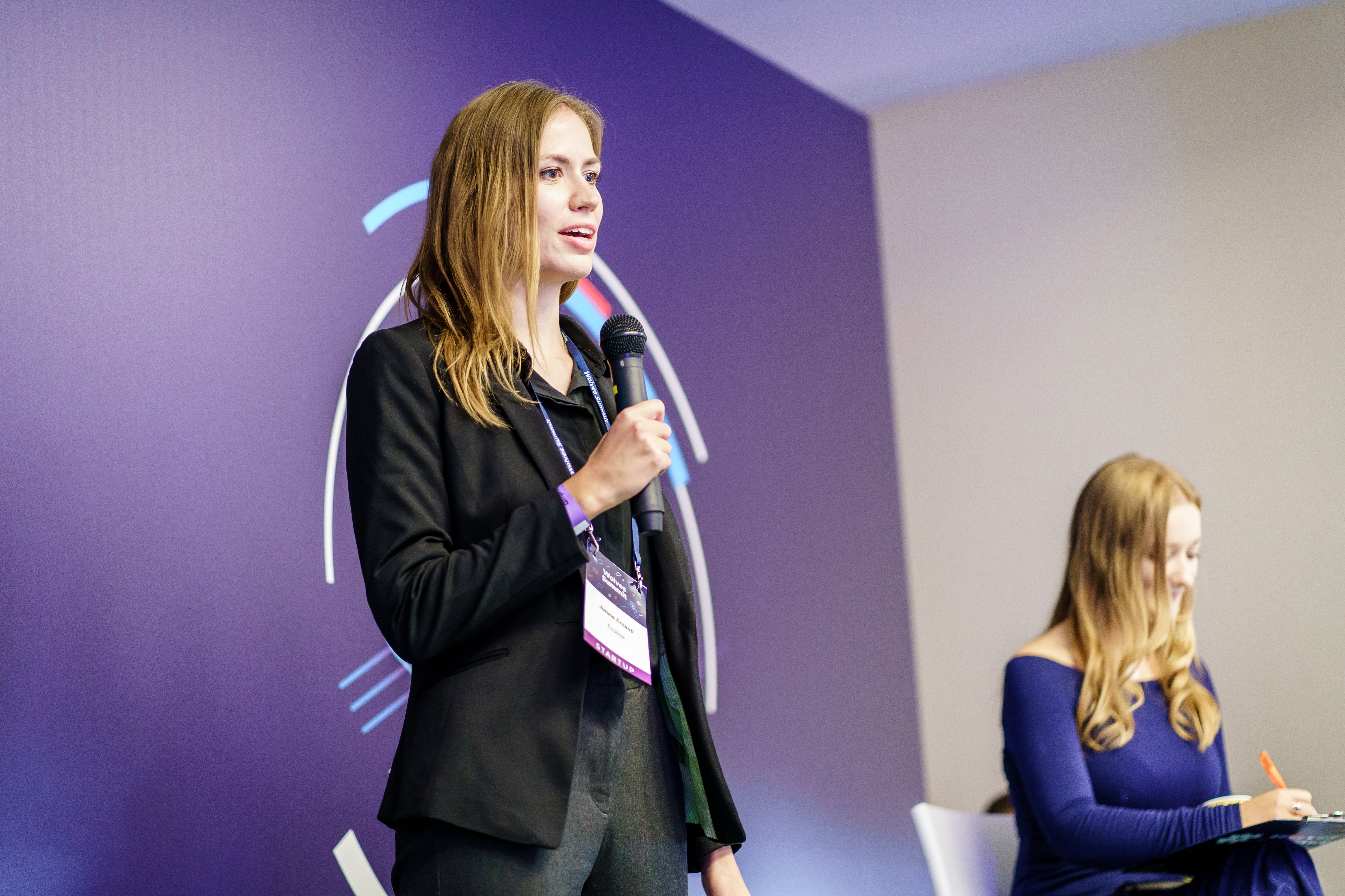 A lady presenting her business.